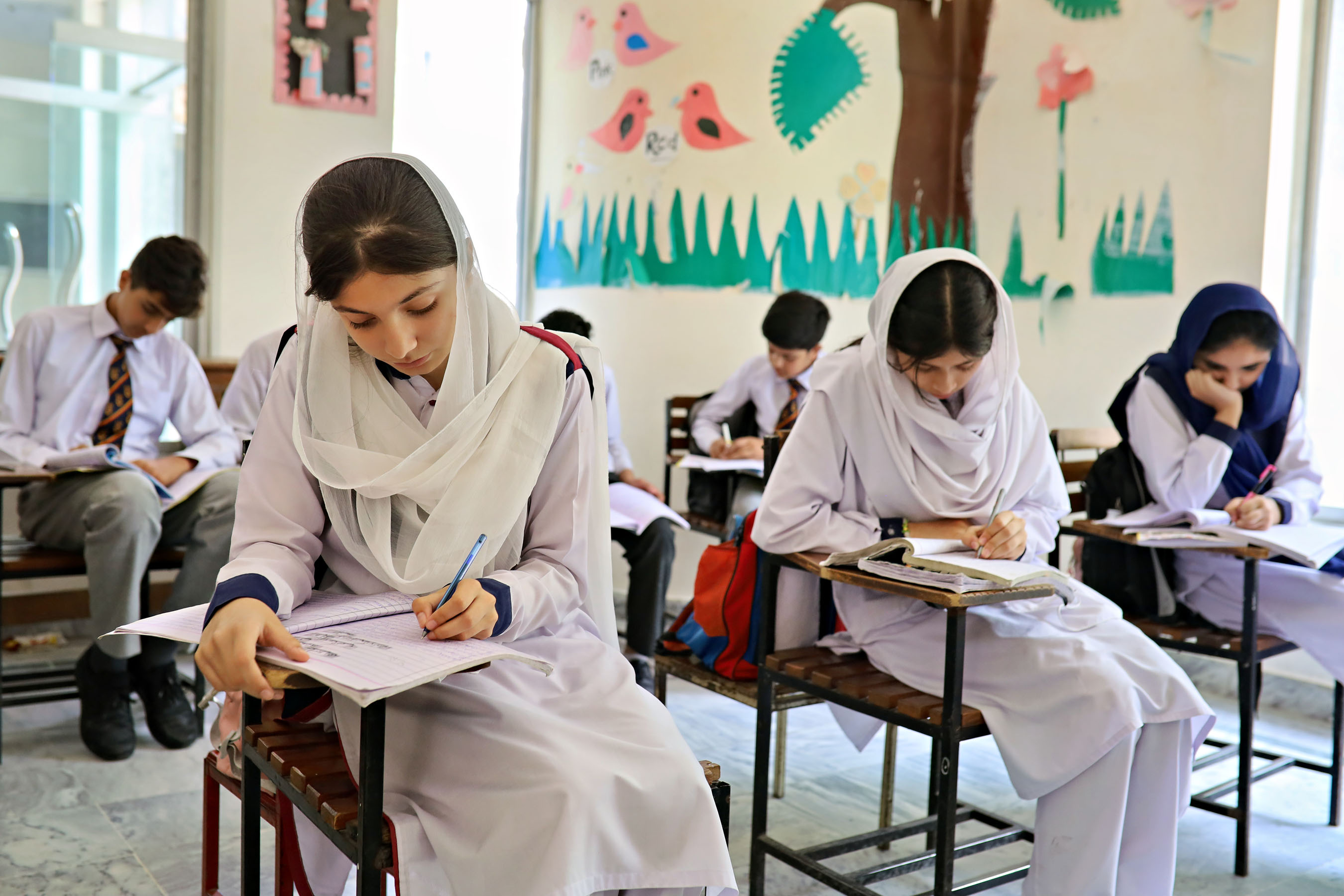 Students at work during a lesson in a Present Times classroom